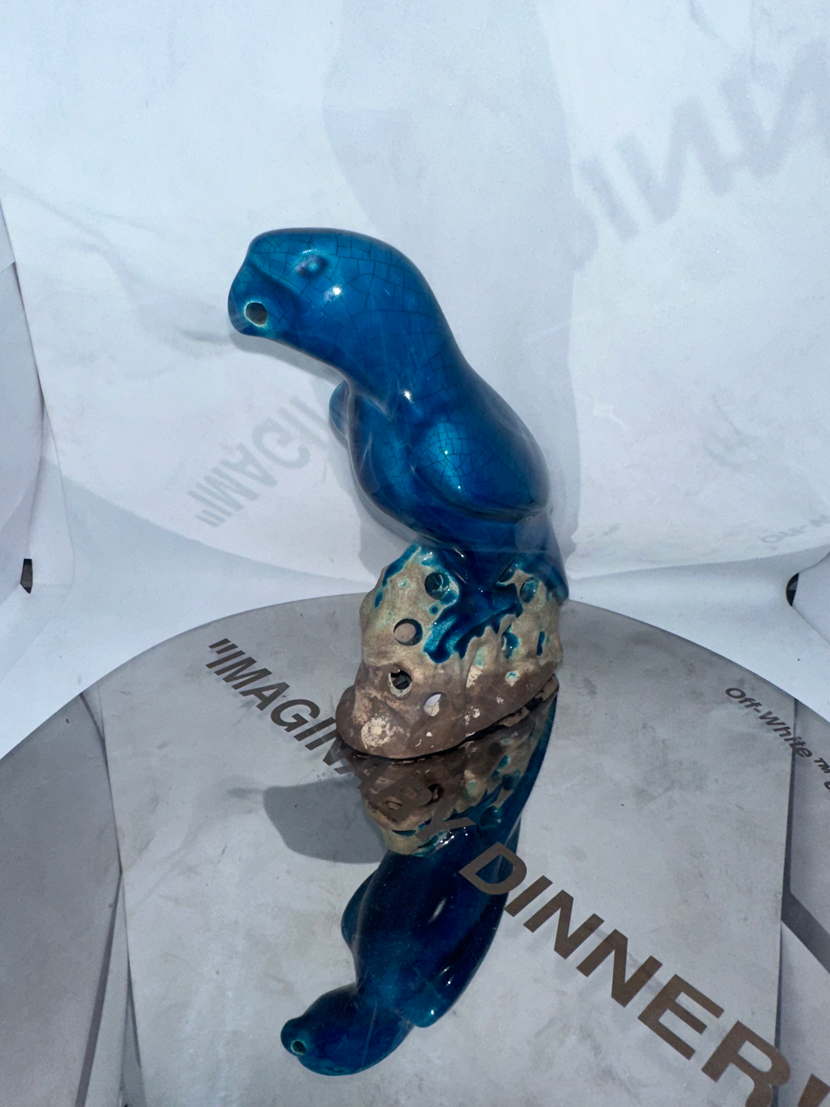 Perroquet en porcelaine émaillée turquoise